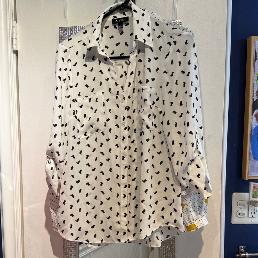 A. Byer White and Black Blouse